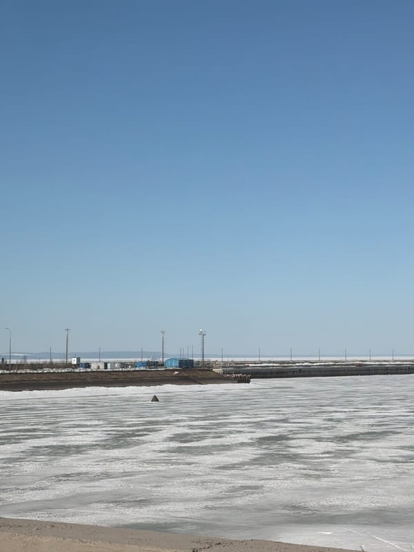 Frozen river port documented in Chaikovsky, Russia