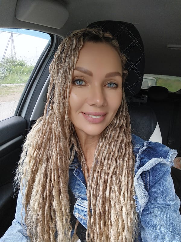 Selfie session in a car, mix of indoor and overcast outdoor shots