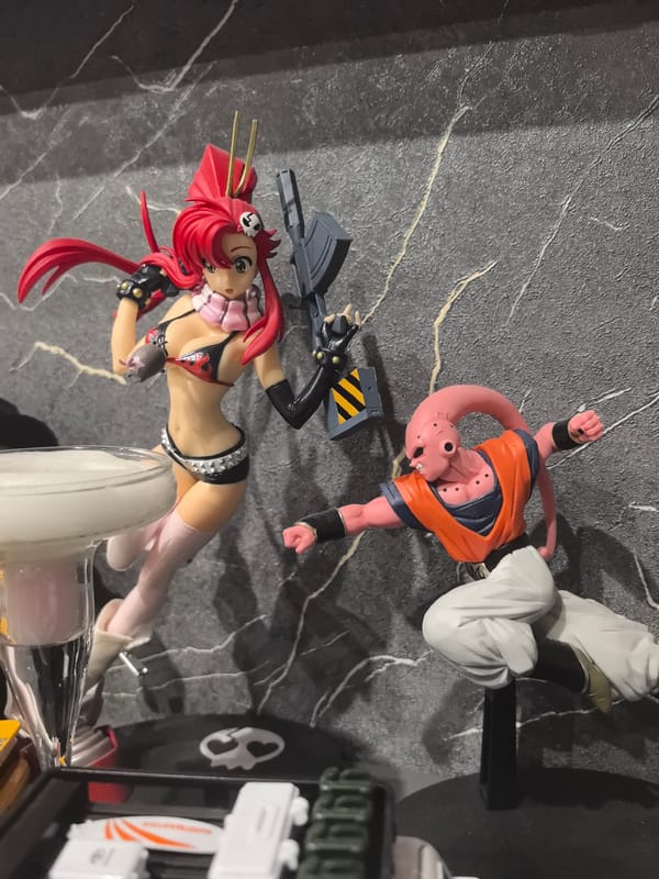 Anime figures and die-cast cars displayed in Amursk