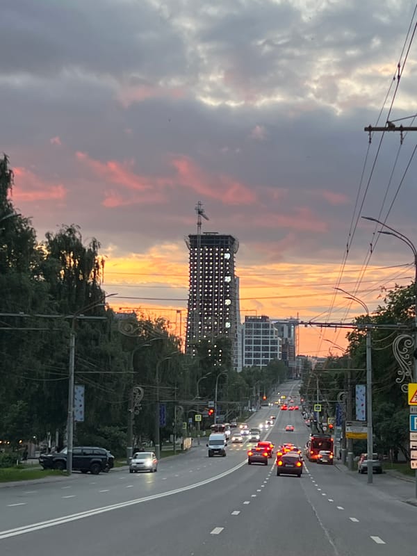 Dramatic sunset colors city skies over Izhevsk, Russia