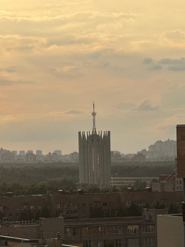 Sinyavino at dusk: Soviet blocks, sunset skies, and street-level art