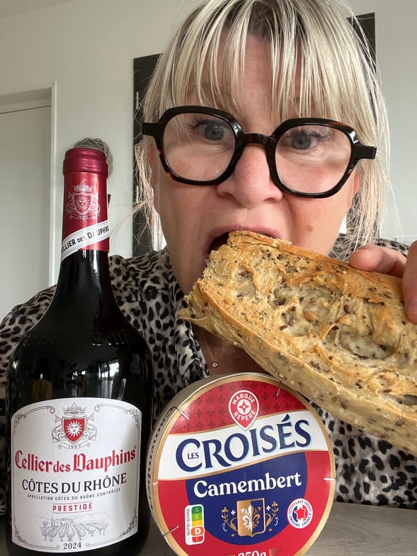 Woman enjoys wine and meal in Chambœuf, France
