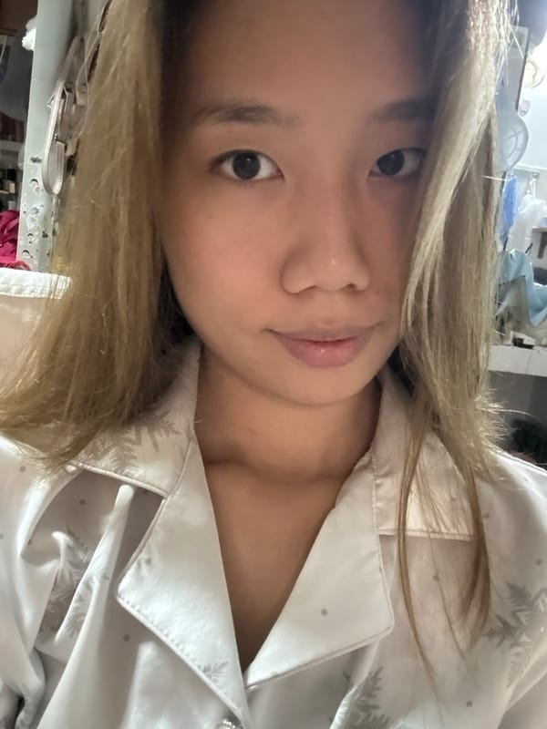 Woman takes indoor selfie in pajamas in Nan'an District
