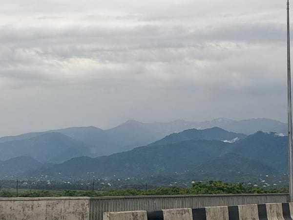 Rainy morning drive through Kobuleti's misty mountain landscape