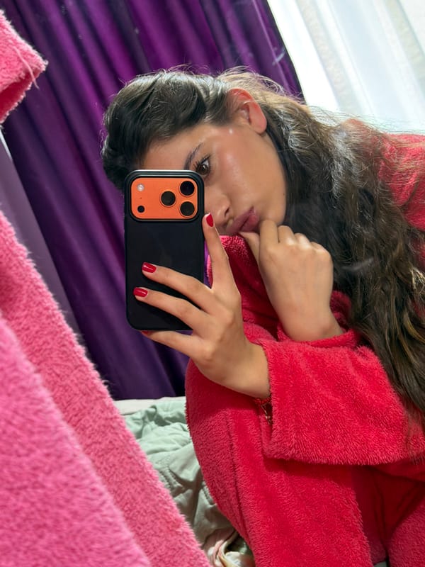 Woman takes morning selfie in fuzzy robe in Bulgaria