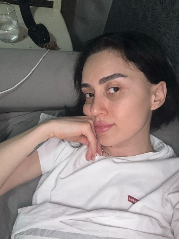 Wine drinking captured by witnesses in Tbilisi indoor setting