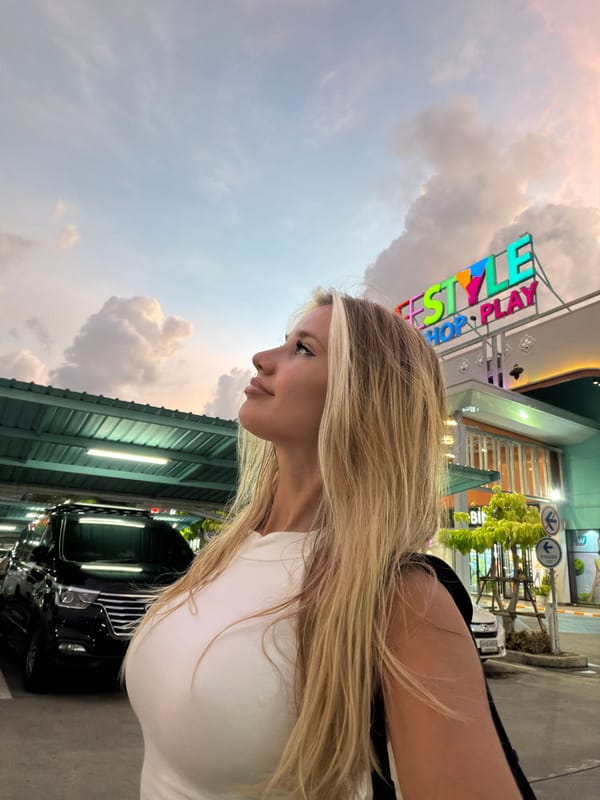Parking lot photo session under a dramatic Si Sunthon sky