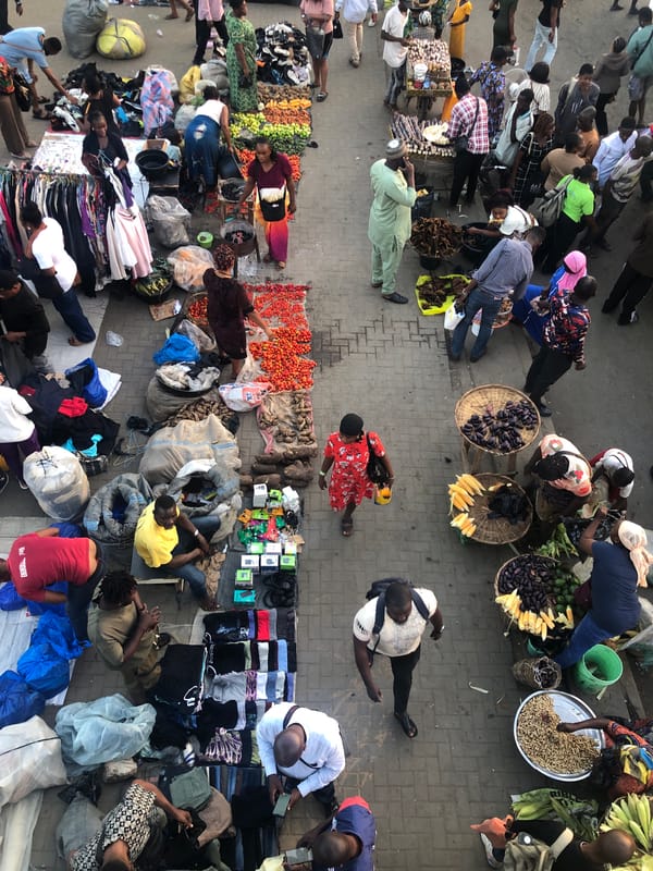 Ikeja street market buzzing with vendors and shoppers