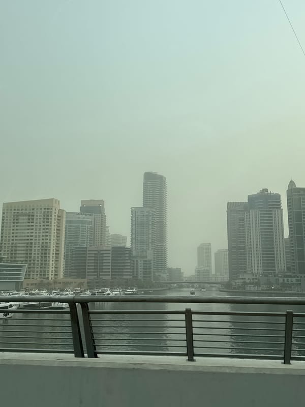 Street and marina views across Dubai Marina, mid-afternoon