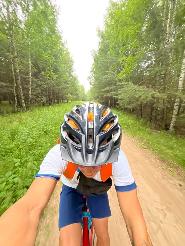 Mountain biking through forested trails near Chaikovsky, Russia