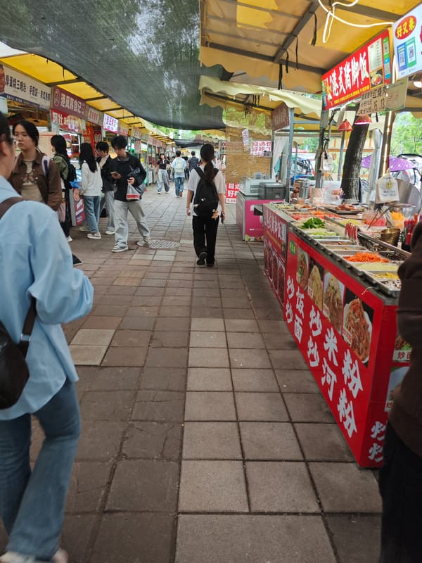 Morning street food scene draws pedestrians in Shapingba District