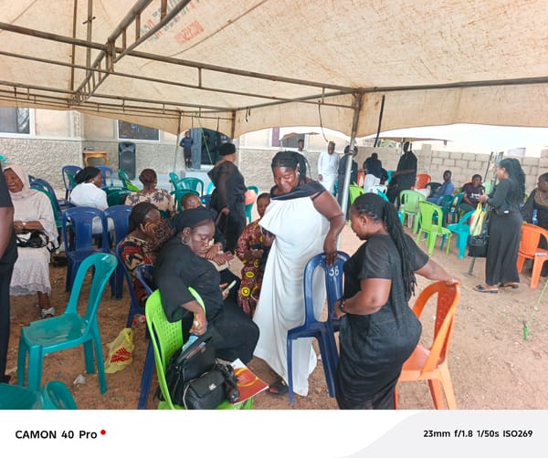 Outdoor gathering held under canopy in Jos, Nigeria