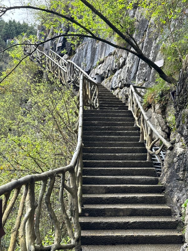 Tourists explore scenic gorge attractions in Qianjiang, China