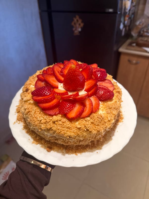 Strawberry-decorated layer cake displayed in Rishon LeZion kitchen