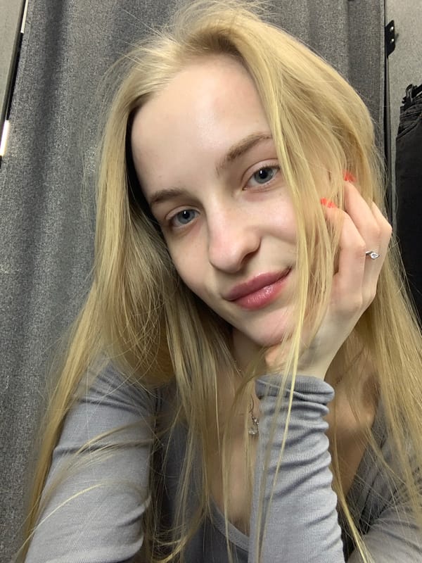 Woman takes multiple selfies in Kyiv clothing store dressing rooms