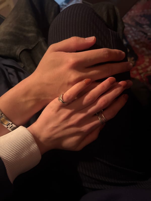 Early morning subway selfie captured in NYC station mirror
