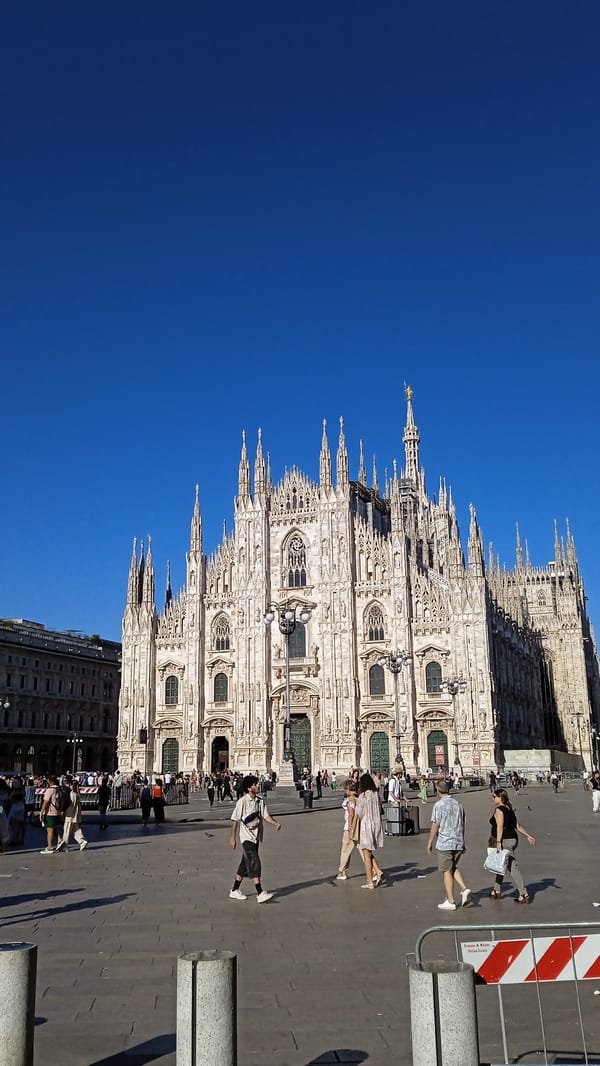 Busy afternoon around Milan's Duomo plaza