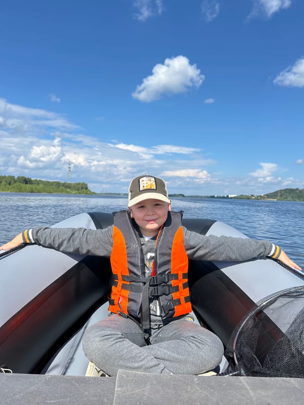 Summer day on the river: boats, forests, and a ski jump