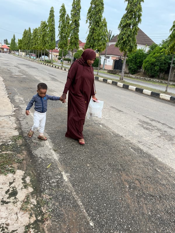 Daily life unfolds across Abuja streets in morning observations
