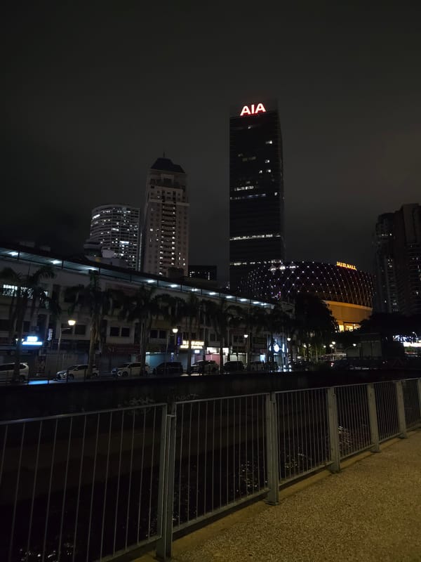 Nighttime KL: towers, streets, and city lights