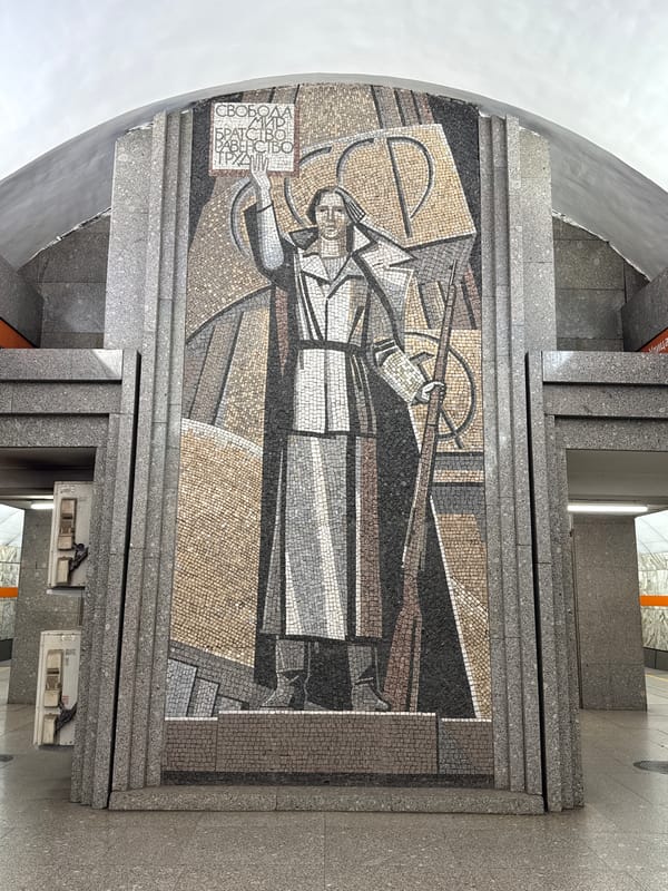 Metro passenger documents socialist art, train interior in Saint Petersburg