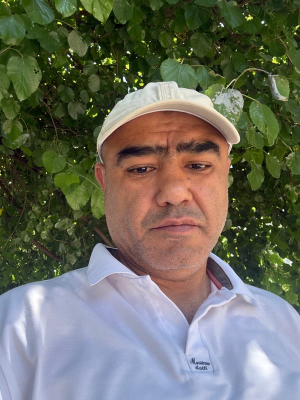 Selfie series among green foliage in Tashkent