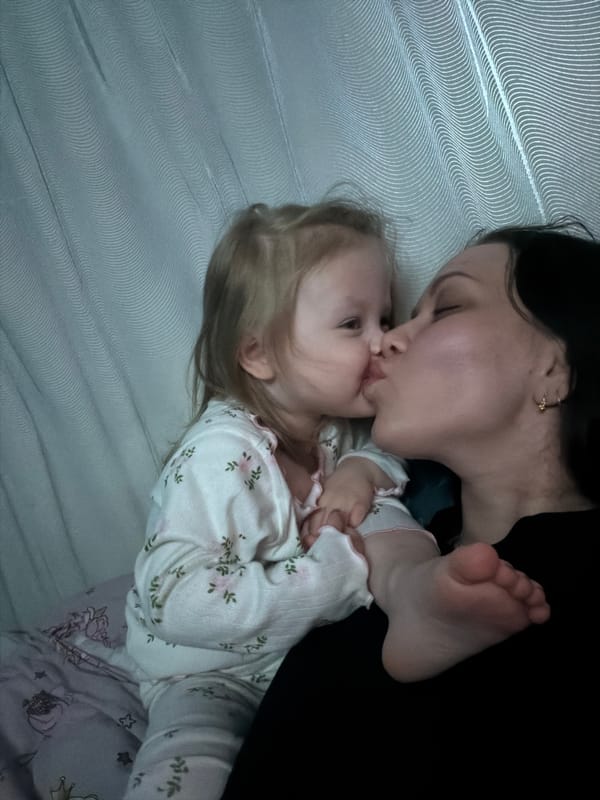 Mother and child share bedtime moments in Perm