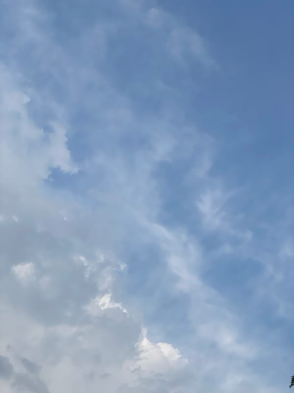 Fair weather with scattered clouds observed in urban area