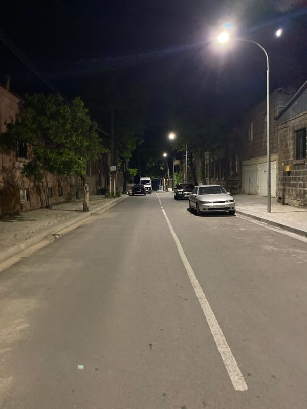 Gyumri streets at night, stone buildings and streetlights