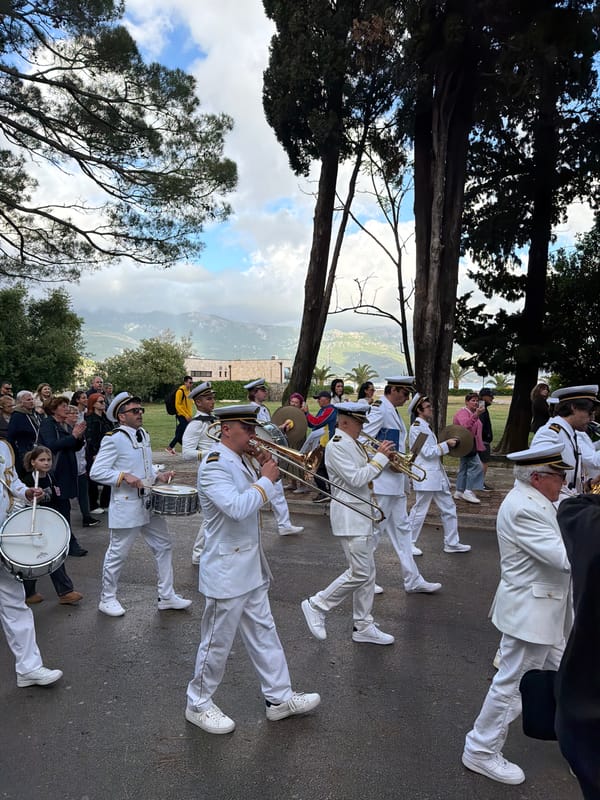 Marching band parades through Budva streets drawing crowds