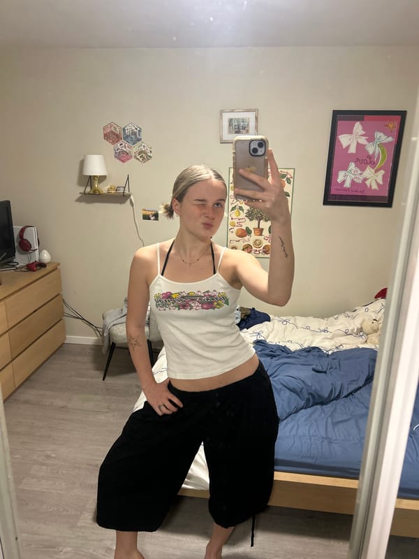 Woman Takes Selfies in Vancouver Bedroom