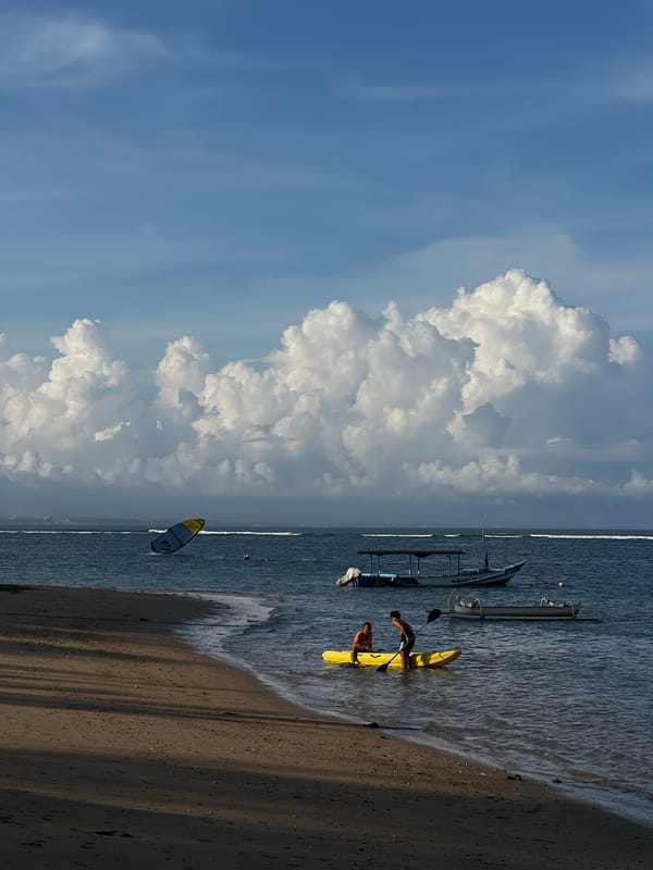 Morning beach scenes captured in Denpasar resort area