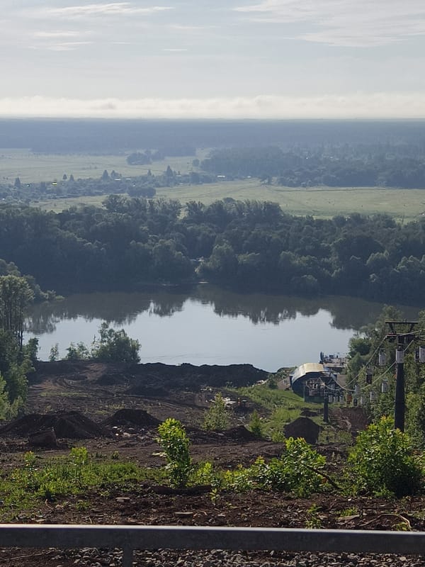 Ufa's hillside cable car and forest trail area in summer