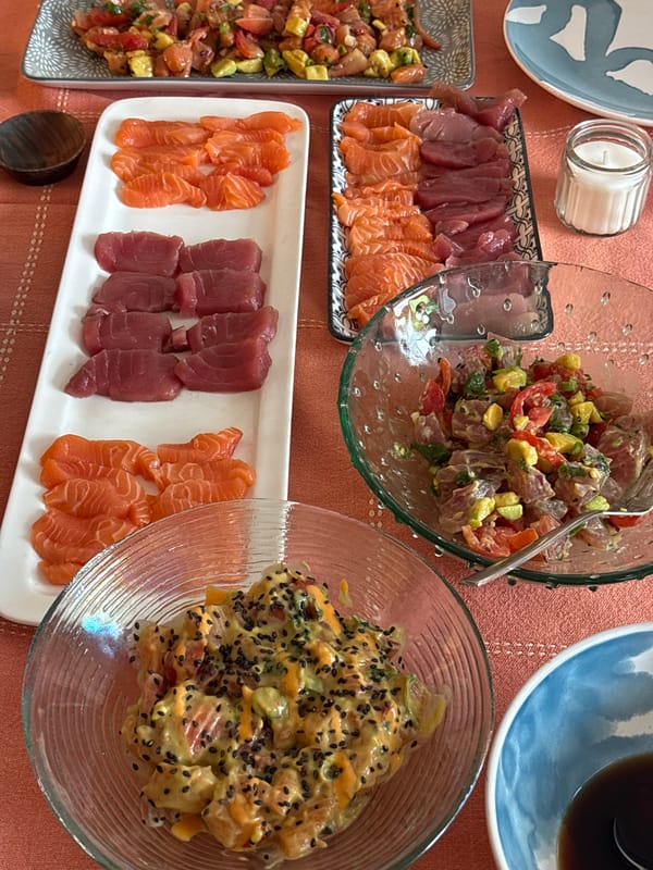 Raw fish dishes arranged on residential table in Tel Aviv