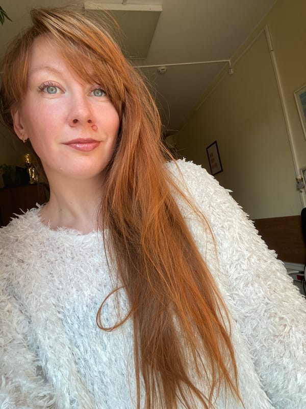 Woman takes morning selfies in Krasnoyarsk apartment