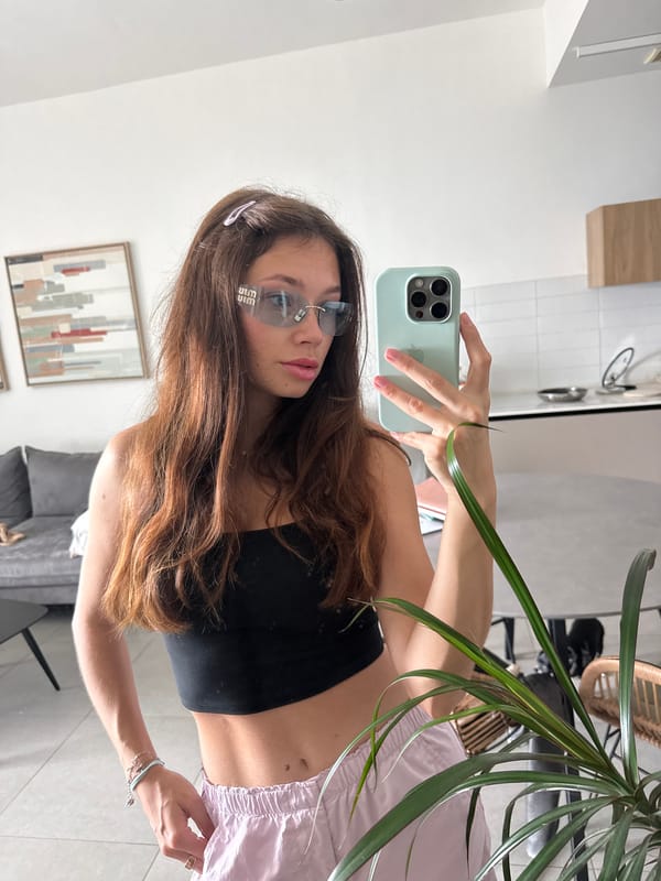 Woman takes selfies, prepares food at Ramat Gan home
