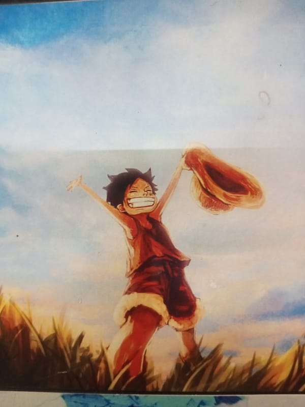 Printed art, anime collectibles, and street food in Turumame