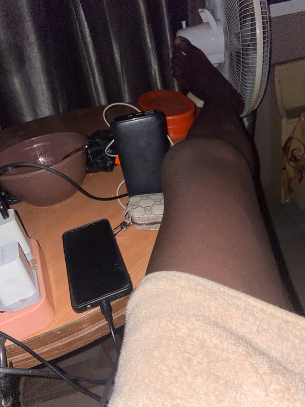 Electric fans documented in two Nigerian locations during evening hours