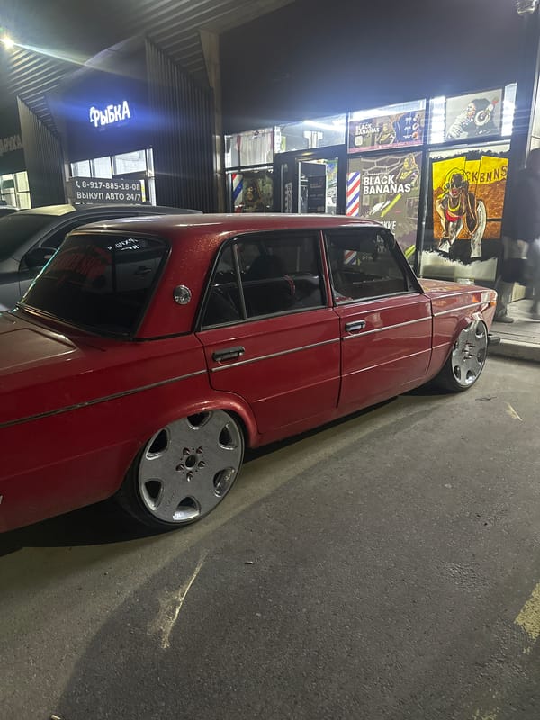 Red Lada with custom rims spotted parked in Nizhnekamsk