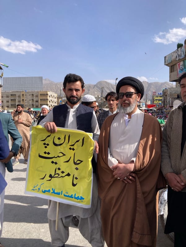 Men hold peaceful protest with banners in Quetta
