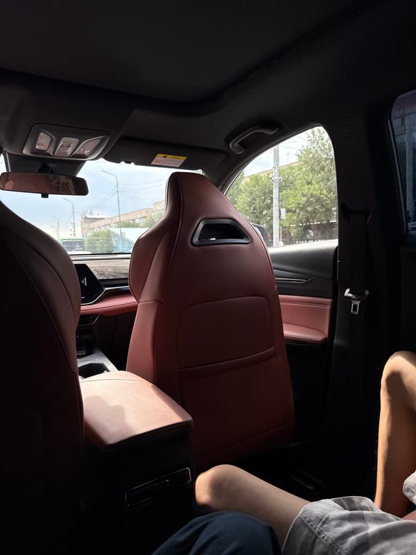 Casual car ride through Almaty on a cloudy summer morning