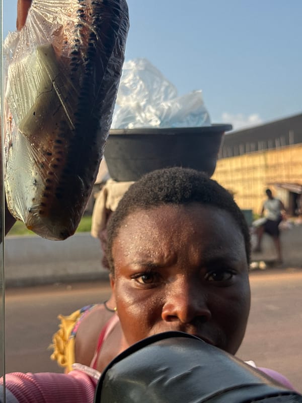 Afternoon street activity in Okposi, Nigeria