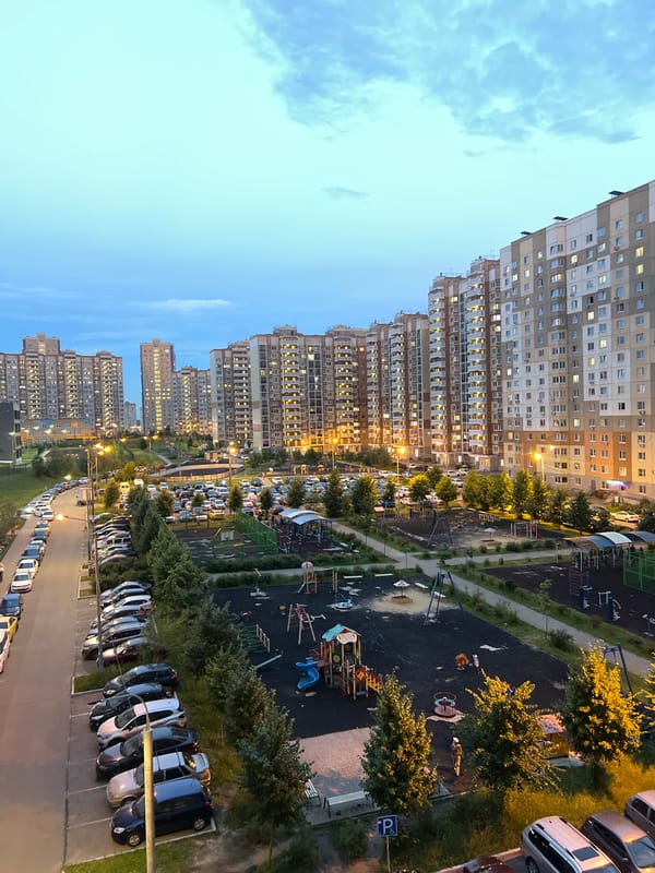 Apartment buildings at dusk, shot from multiple angles at golden hour