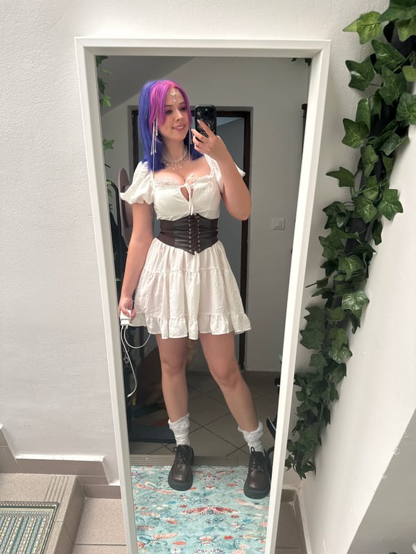 Woman takes mirror selfie in colorful outfit in Zagreb
