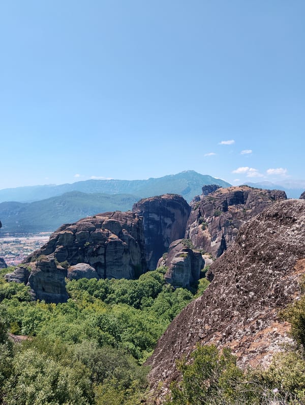 Meteora's rock pinnacles and cliff-top monasteries on a clear morning