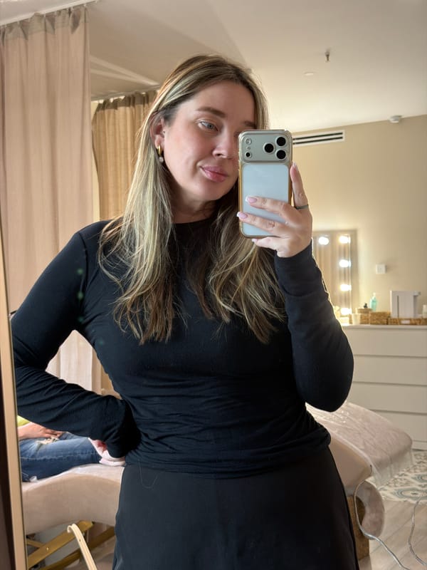 Woman takes mirror selfies in Dolgoprudny apartment