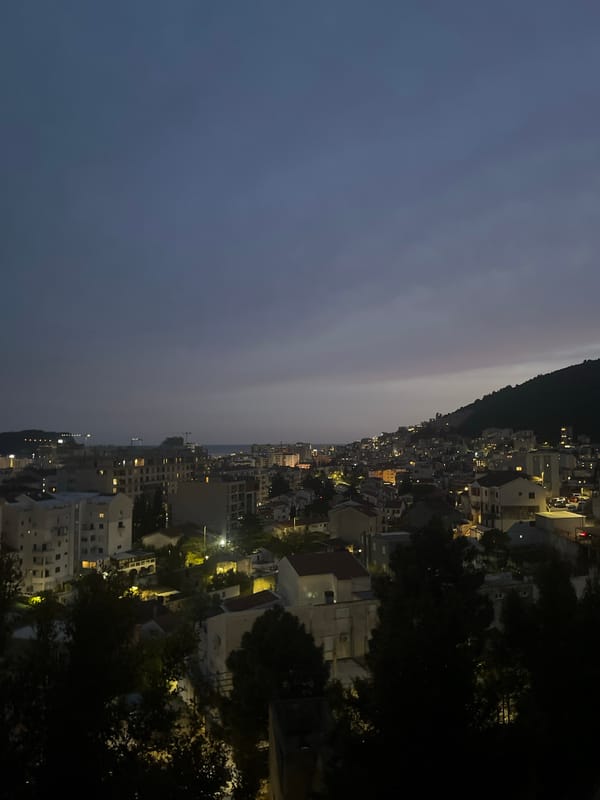 Nighttime view captured of Budva Montenegro coastal cityscape