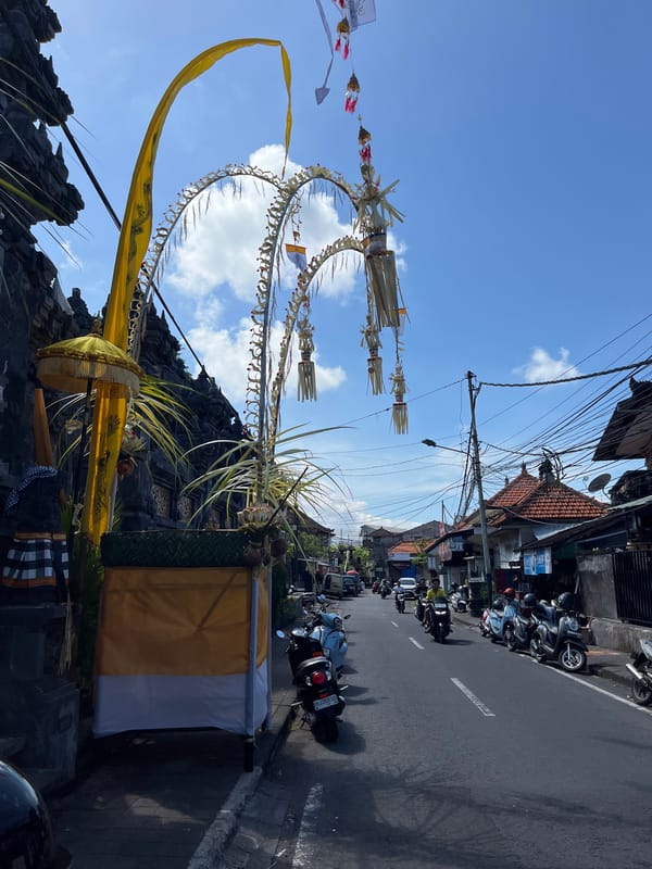 Traditional Balinese street decorations and temple observed in Kuta Selatan
