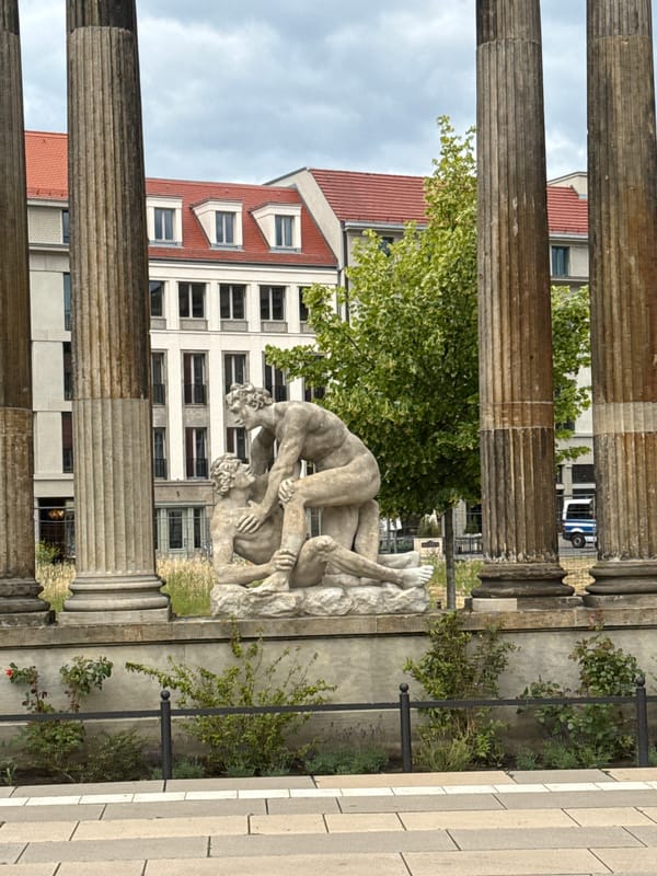 Tourist documents Potsdam's neoclassical architecture during brief city visit