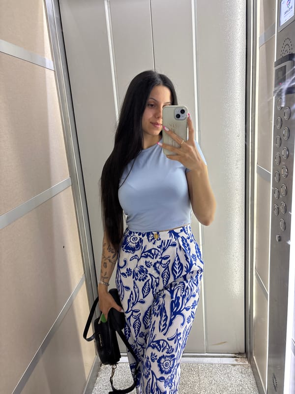 Woman takes selfie in elevator in Sliven, Bulgaria